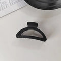 Elegant Black Geometric Hair Claw