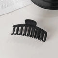 Elegant Black Geometric Hair Claw
